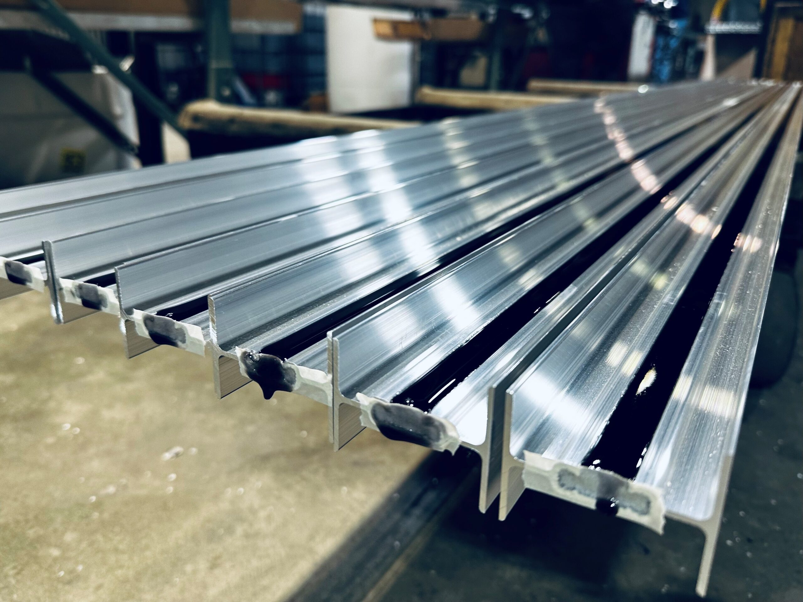 Cured thermal barrier polymer in extrusion